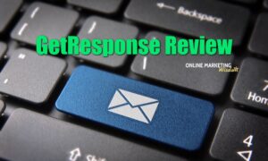 featured image for the GetResponse review article showing a keyboard with a blue email button
